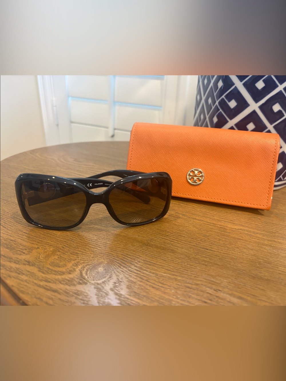 Tory Burch Orange Saffiano Leather Wallet with Gold Logo and sunglasses